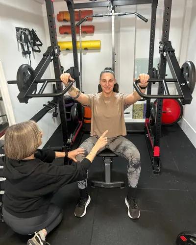 Liz Shaw personal trainer working with a client at The Everstrong Gym, Ealing